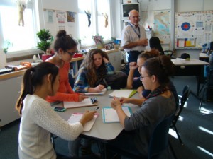 A group of High School students working to improve a boring sentence.